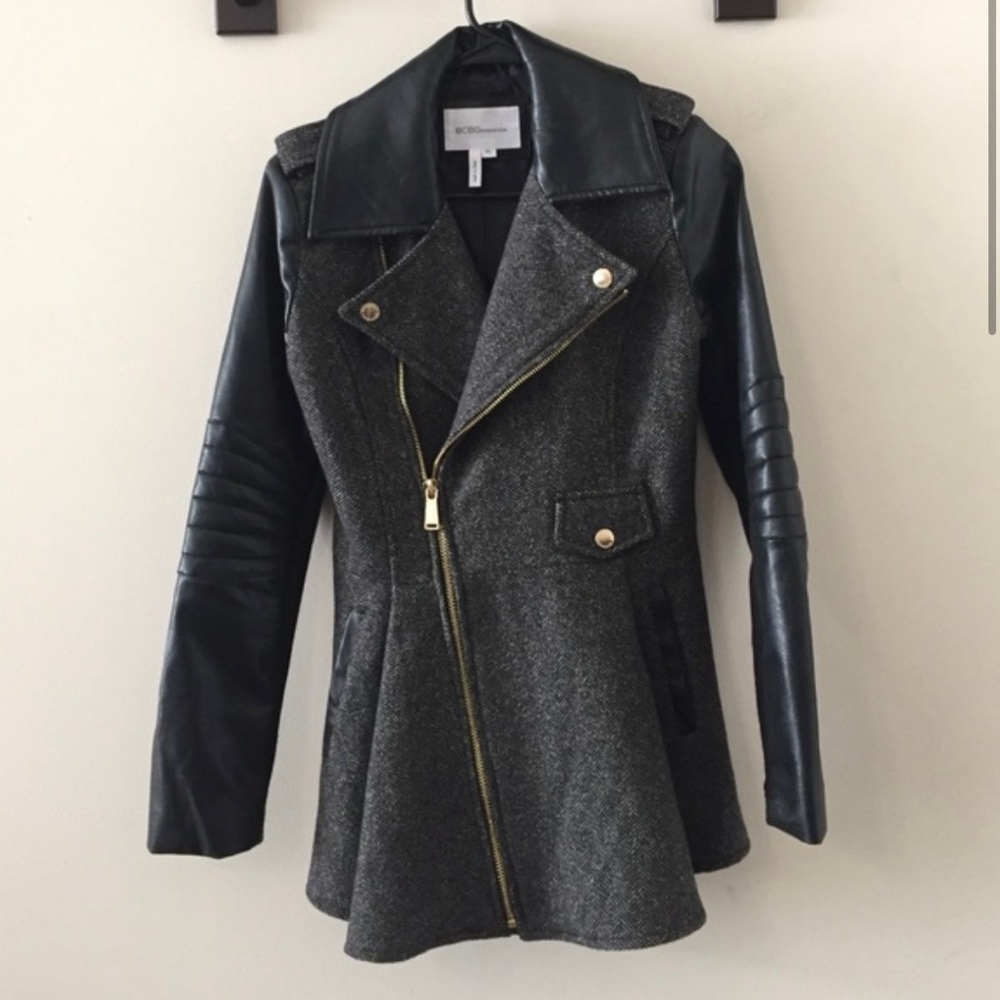 Grey herringbone wool coat with leather sleeves in a flattering peplum style.